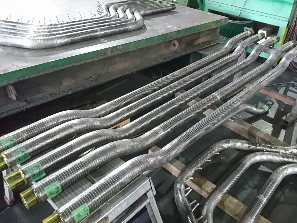 長尺肉盛管の曲げ加工